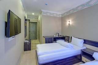 Отель Resident Hotel Almaty Алматы Двухместный номер с 2 отдельными кроватями-5