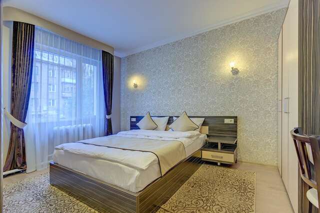 Отель Resident Hotel Almaty Алматы-3